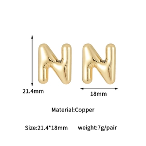 Detailed view of gold letter N bubble earrings with dimensions 21.4mm by 18mm