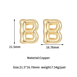 Detailed view of bubble letter B earrings with copper material and size measurements