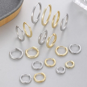 Minimalist 14K gold plated huggie hoop earring set in various sizes and finishes