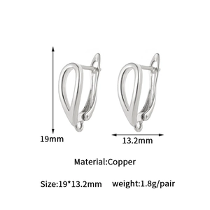 Macro detail of 19mm pear-shaped silver copper earring clasps with precise dimensions