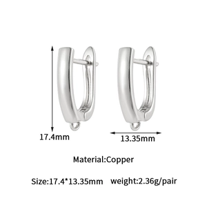 Detailed view of silver U-shaped hoop earring finding with small DIY hanging loop