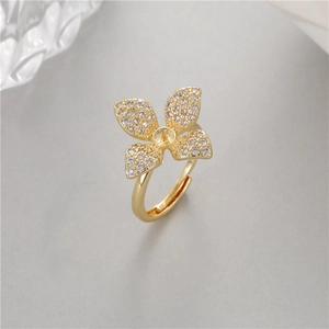 Adjustable gold clover ring with cubic zirconia setting for DIY pearl mounting