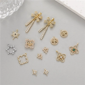 Selection of cubic zirconia bowknot and floral pendants in gold and silver plating