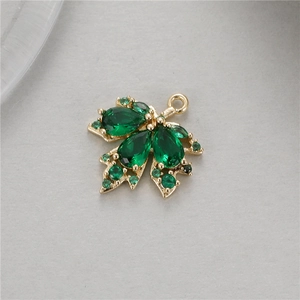 Golden maple leaf charm with green zircon drop stones and pavé crystals for DIY jewelry