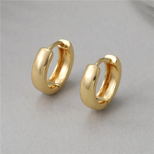 Polished thick gold hoop earrings with minimalist circular design and hinged closure