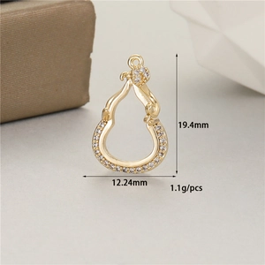 Detailed view of a 14K gold plated gourd pendant with cubic zirconia and dimensions