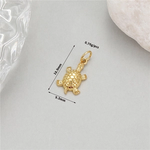 Detailed view of a 14K gold plated tortoise pendant with polished finish and dimensions