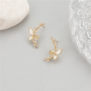 Exquisitos pendientes de mariposa y flores en oro de 14k con nácar blanco y circón
