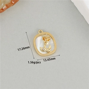 Detailed macro view of 14K gold rose pendant with natural white shell and dimensions
