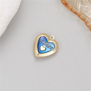 Heart locket pendant in 14K gold plating with blue enamel and Sweet engraving