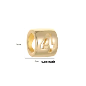 Macro detail of a 14K gold-plated number 4 bead with dimensions of 7mm by 6mm