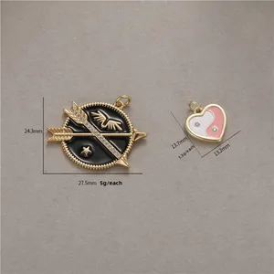 Arrow badge and Yin Yang heart pendants with micro-inlaid zircons and enamel finish