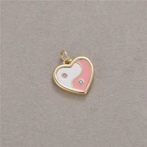 Golden heart pendant with pink and white Tai Chi enamel inlay and micro-set crystals