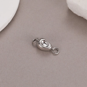 Chiusura magnetica a fagiolo in argento con zirconi e doppi anelli per creazione gioielli