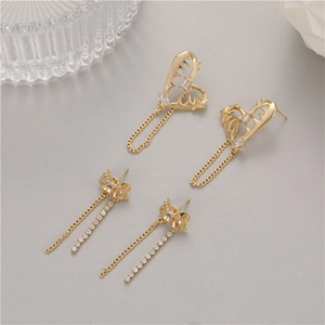 Golden heart earrings with sawtooth tassel and zircon drop in elegant jewelry style