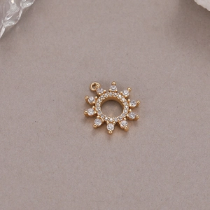 14K gold-plated sunburst pendant with sparkling white zircon stones for jewelry making