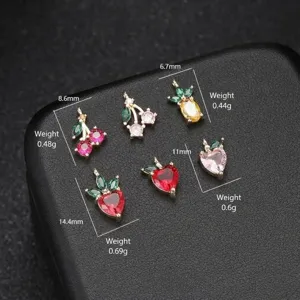 Macro-opname van kleurrijke vruchtenhangers met goudlaag en zirkonia voor DIY-sieraden