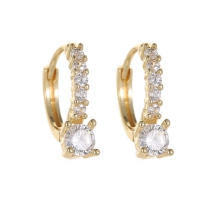 Minimalist gold hoop earrings featuring sparkling cubic zirconia stones and four-prong setting