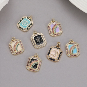 Detailed macro view of colorful enamel rectangular charms with zironia pave borders