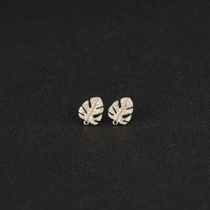 Elegant 14K gold plated monstera leaf earrings with micro-pave cubic zirconia crystals