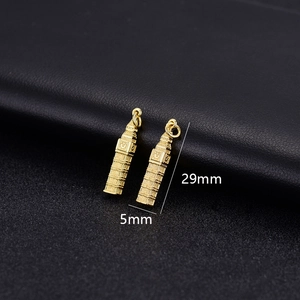Macro detail of Big Ben charm pendant in 14K gold plated finish with 29mm height measurements