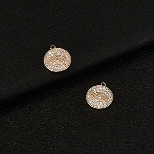 Elegant 14k gold plated evil eye charm pendants with sparkling white cubic zirconia stones