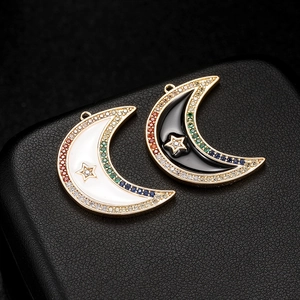 14K gold plated moon pendant with star center and colorful cubic zirconia inlay