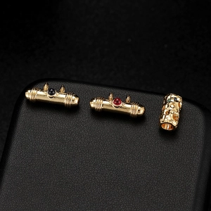 Three-piece set of 14K gold plated cylindrical gemstone pendants and textured DIY beads