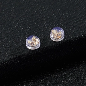 Fermoirs de boucles d'oreilles en silicone transparent avec noyau en métal doré