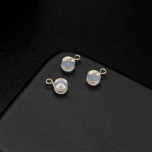 Fermoirs de boucles d'oreilles en silicone transparent avec boucles en métal doré