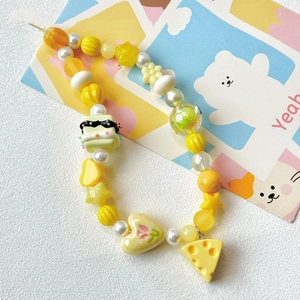 Handmade dopamine yellow beaded phone strap with cake and cheese charms for DIY jewelry