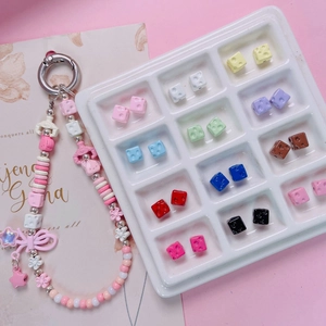Detail showing 7mm alloy cheese cube beads and colorful DIY jewelry making components