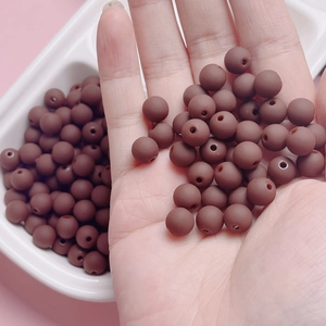Detail of 6mm/8mm matte dark brown rubberized beads for DIY necklaces and crafts