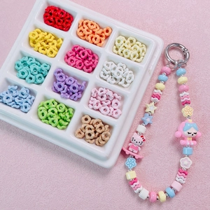 DIY charm jewelry kit with multi-colored wave beads and Hello Kitty character strap