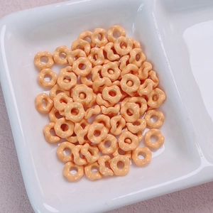 Cute orange resin wavy flower charms for DIY phone chains and jewelry making