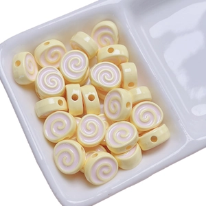 Narutomaki style acrylic beads in yellow and pink for DIY jewelry and phone charms