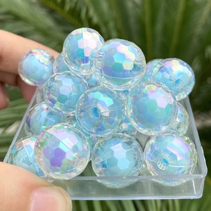 Macro detail of faceted light blue beads with iridescent AB coating for DIY jewelry