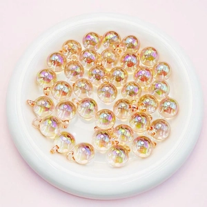Macro shot of 16mm AB iridescent round candy pendants for DIY jewelry making
