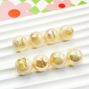 Macro shot of 16mm iridescent UV plated bunny beads for DIY jewelry making