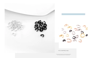 Detailed view of DIY metal jump rings in silver, black, gold and rose gold finishes