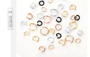 Assorted gold, silver, and rose gold jump rings for DIY jewelry making accessories