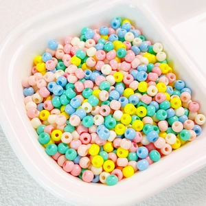 Close-up of mixed macaron color 4mm glass seed beads for DIY jewelry making
