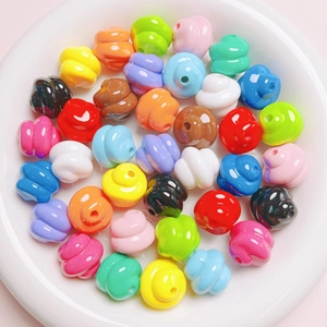 Close-up of colorful poop-shaped acrylic beads for DIY jewelry and phone chain making