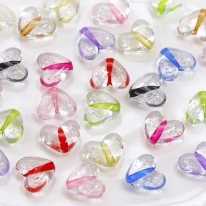 Macro shot of colorful acrylic heart beads with bubbles for DIY jewelry making