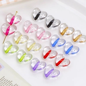 Macro detail of acrylic heart beads with colorful bubble texture for DIY jewelry making