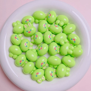 Detail of 20mm neon green acrylic rabbit beads for DIY phone chains and jewelry