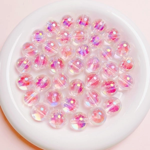 Detailed macro view of 16mm Aurora pink beads for DIY jewelry and phone charms
