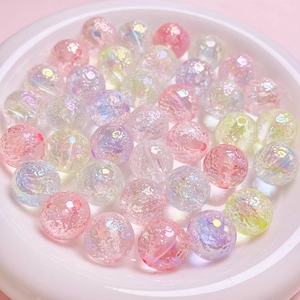 Pastel dream planet cracked round beads for DIY jewelry making in a white tray