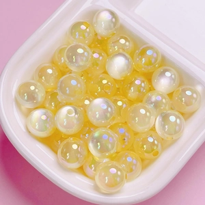 Pastel yellow iridescent cat eye acrylic beads for DIY jewelry and phone chains