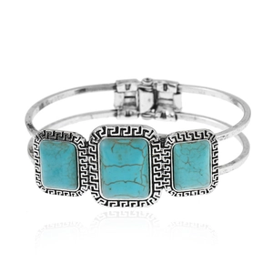 Vintage zilveren armband met drie rechthoekige blauwe turkooizen en Griekse patronen